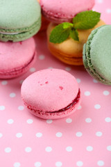 Gentle macaroons on table close-up