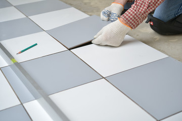 Installing ceramic tiles on a floor