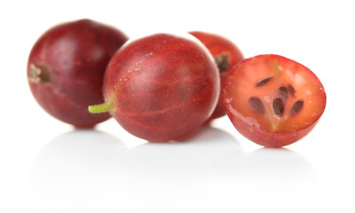 Ripe gooseberries isolated on white.