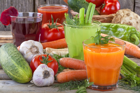 Healthy vegetable juices of carrot, celery, beetroot and tomato