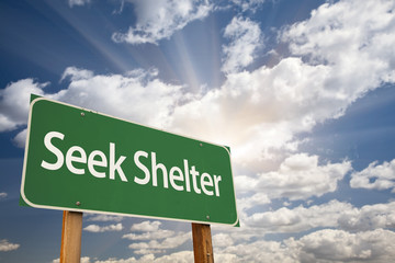 Seek Shelter Green Road Sign
