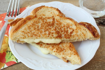 Grilled cheese sandwich made with cheddar