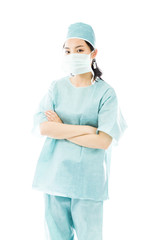 Confident Asian female surgeon standing with arms crossed