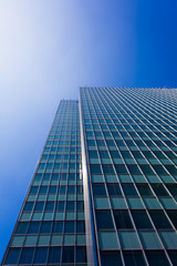 Modern glass silhouettes on modern building.