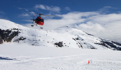 Naklejka na ściany i meble Helicopter Glacier Landing