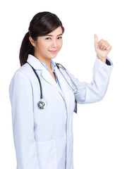 Doctor woman with thumb up