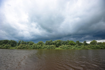 wonderful landscape on the sunny river valley with blue sky and