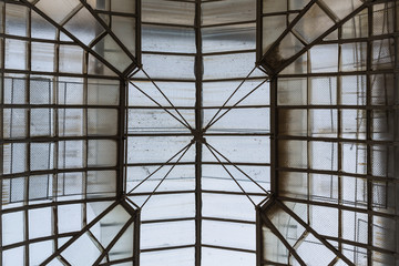 Cupola of retro glass house roof evening inside view