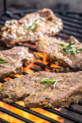 Fresh steak on the grill with fire