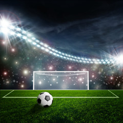 Soccer ball on green stadium arena