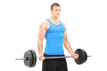 Fototapeta na wymiar Muscular athlete holding a barbell