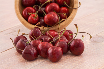 Bowl with red ripe cherries