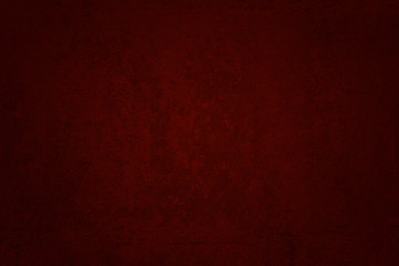 abstract red background or Christmas paper with bright center sp