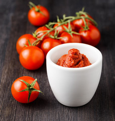 Ripe tomatoes and tomato paste