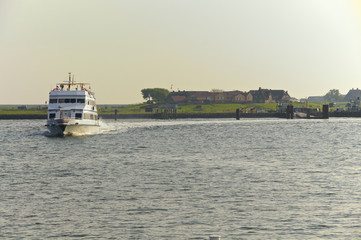Passenger Ship in the Wadden Sea in the North Sea