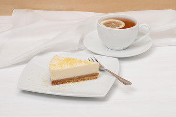 Cheese Cake With Lemon Zest. Tea With Lemon Slice