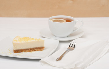 Cheese Cake With Lemon Zest. Tea With Lemon Slice