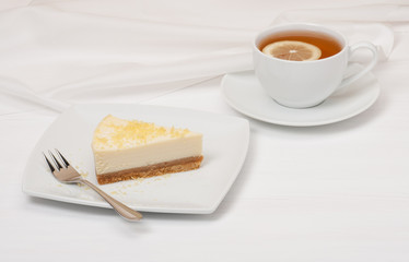 Cheese Cake With Lemon Zest. Tea With Lemon Slice