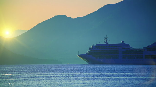 Cruise ship at sunrise. Quiet sea. HD 1080.