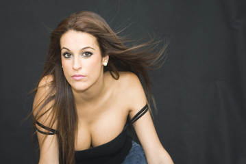 Naklejka premium Beautiful Woman Shaking Her Hair