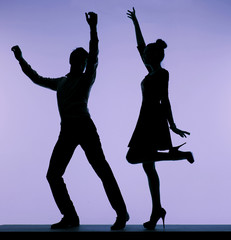 Cheerful young couple in the music club