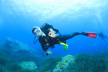 Scuba diving on coral reef