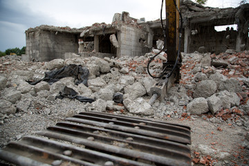 Demolition of old derelict buildings with jackhammer