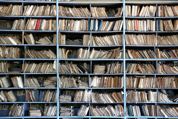 shelves full of files in an old archive - obrazy, fototapety, plakaty