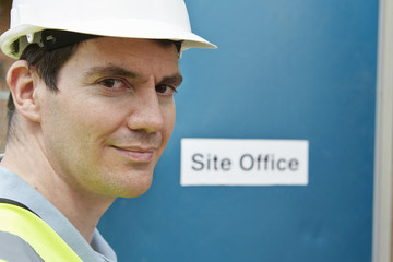 Portrait Of Construction Worker At Site Office