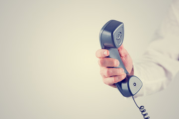 Holding telephone receiver