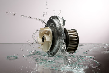 Auto parts, engine cooling pump in spurts of water.
