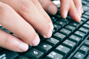 typing on a computer keyboard