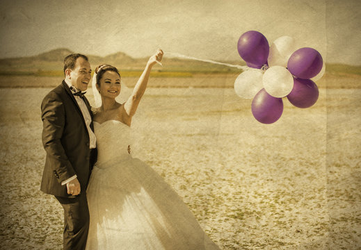 Bride and Groom with Baloons
