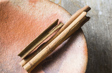 Cinnamon in earthen plate