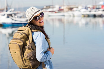 Fototapeta na wymiar female tourist at the harbour