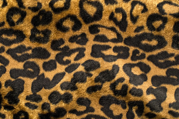 Brown and black leopard pattern. Fur animal print as background.