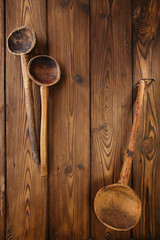 antique vintage wooden spoon on old wooden table in rustic style