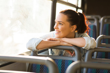 female commuter daydreaming on bus - obrazy, fototapety, plakaty