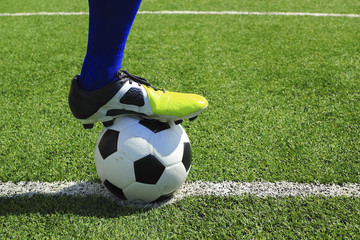 Soccer player's feet at kick