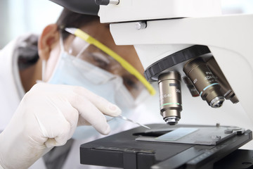 chemist working in lab or laboratory