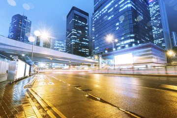 traffic with blur light through city at night