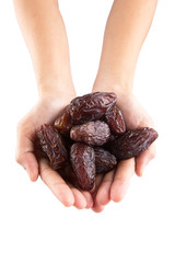 Female hands with date fruits over white background