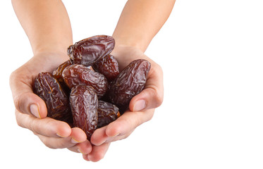 Female hands with date fruits over white background