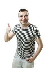 Naklejka premium Glad tall guy showing thumbs up sign. like it!