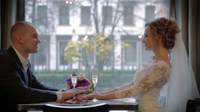 Wedding couple in a prestigious restaurant