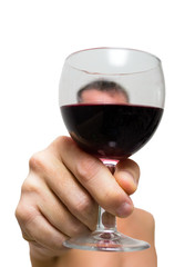 Man making a toast with glass of red wine