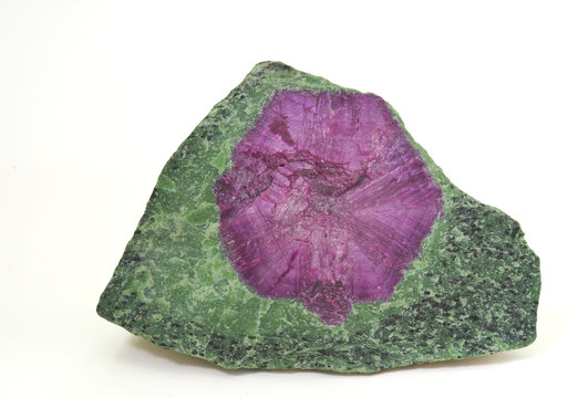 Pink corundum in green zoisite from Tanzania. 20cm across.