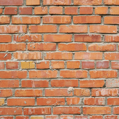 Old red brick wall fragment