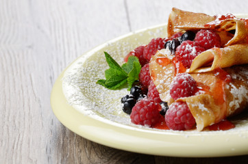 Crepes raspberry blueberries mint
