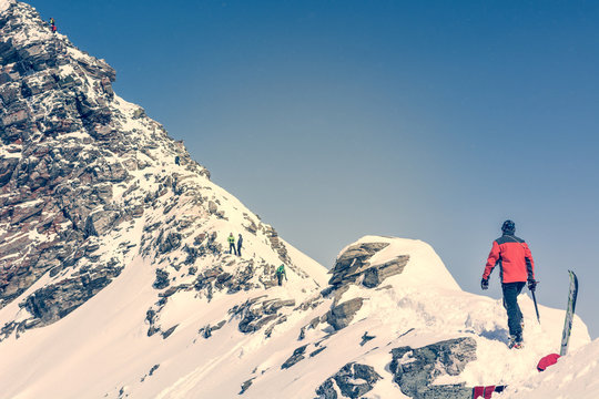 Person ascendind a mountain